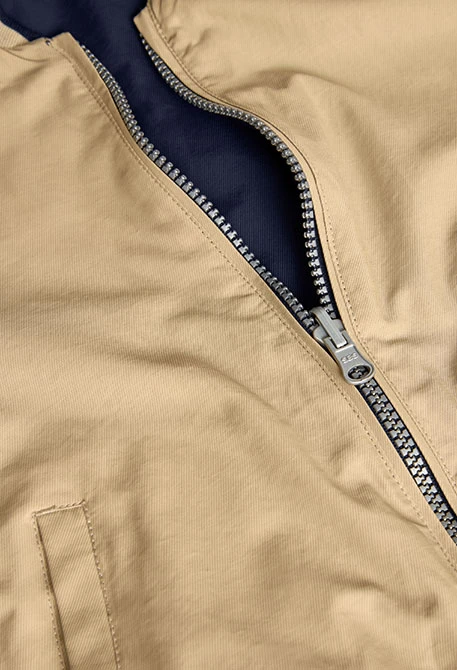 Reversible jacket for boys in navy blue and beige