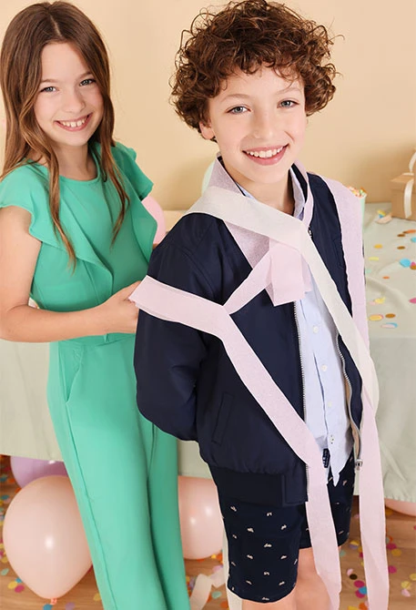 Cazadora reversible para niño en color azul marino y beige