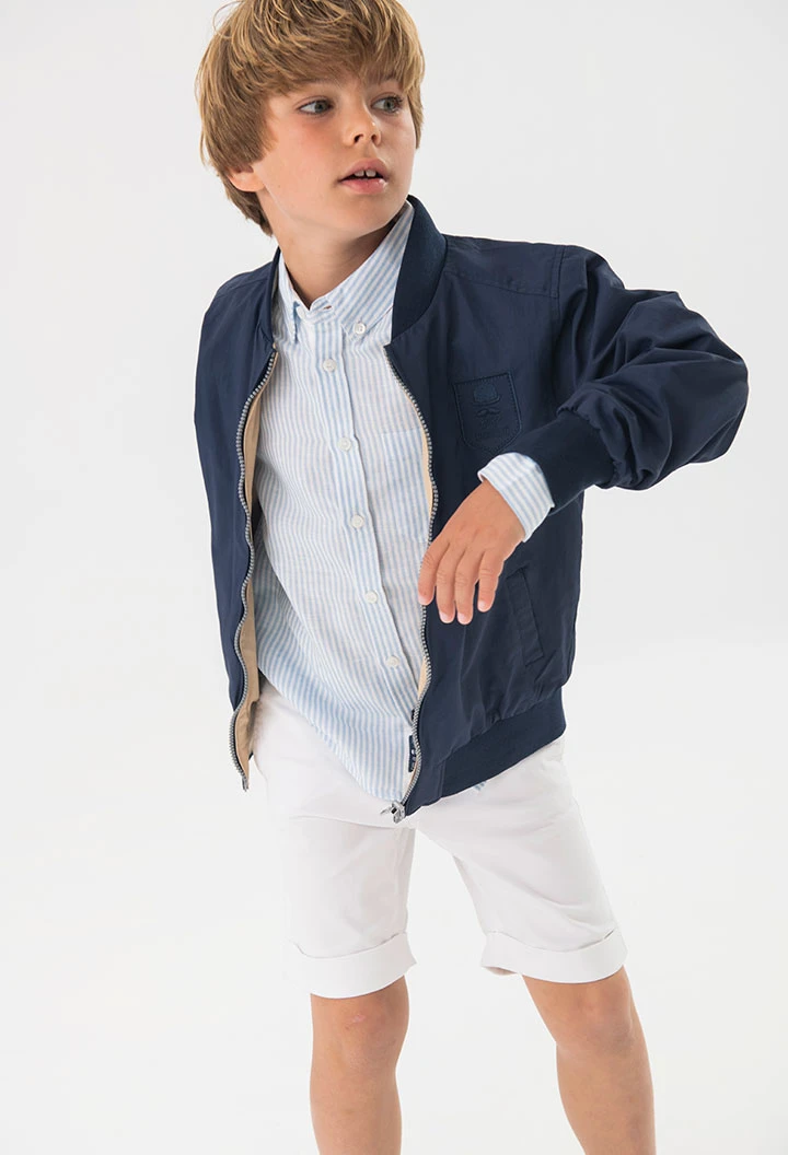 Chemise en popeline pour garçon de couleur bleue à rayures.