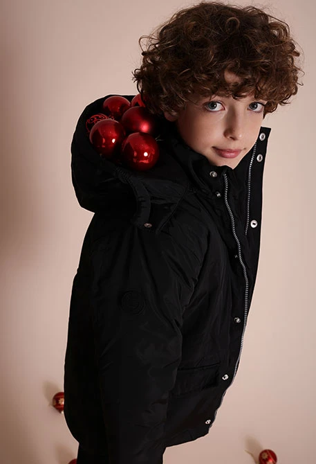 Boy´s parka in black technical fabric