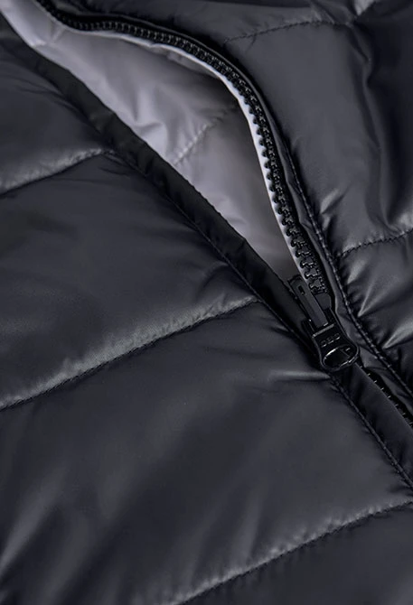 Armilla infantil reversible tècnica negra