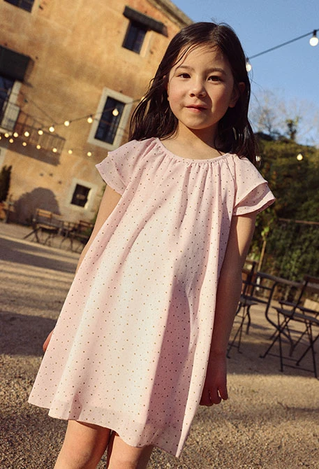 Vestito rosa chiaro