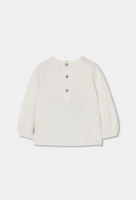 White girl\'s knit T-shirt with blue heart