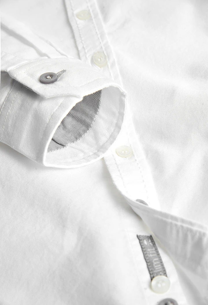 Camisa oxford màniga llarga de nen en color blanc