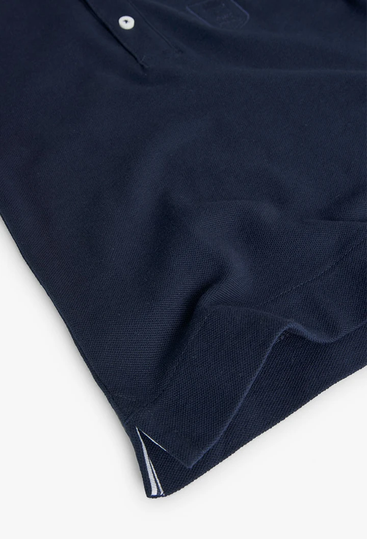 Polo garçon en piqué bleu marine