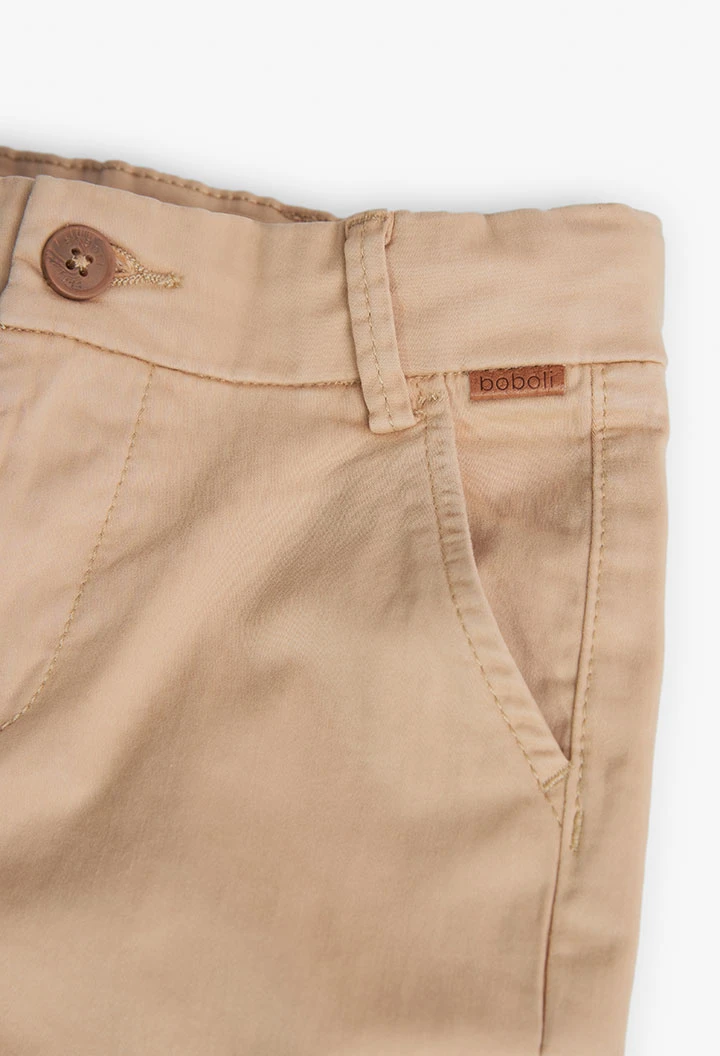 Pantaloni in raso per bambino in beige