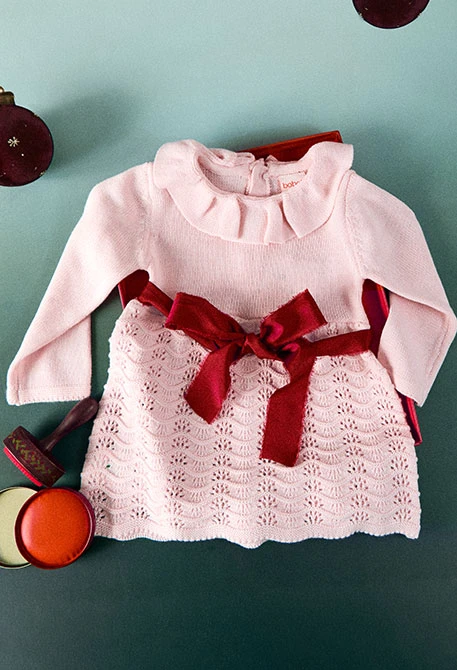 Rosa Babykleid aus Strickstoff
