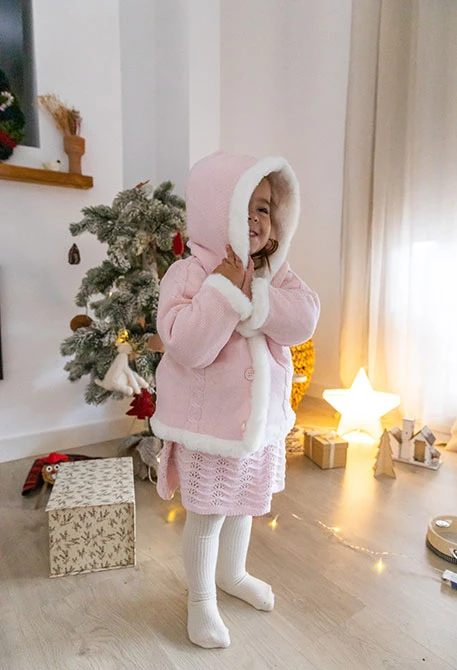 Rosa-weiße wendbare Babyjacke