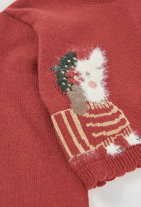 Red knitted girl\'s jacket with puppy print