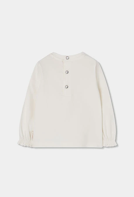 Maglietta in maglia bambina bianca con fiocco dorato