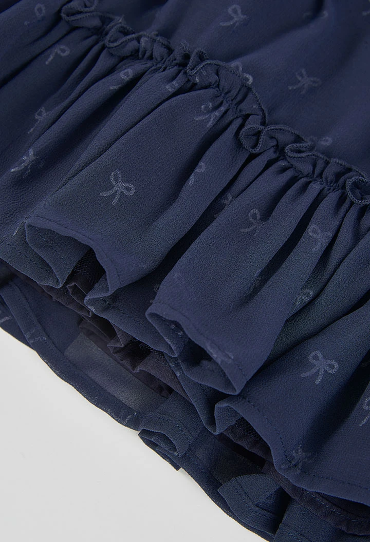 Robe en mousseline bleu marine imprimée nœuds