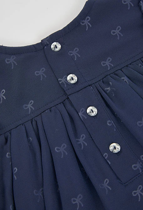 Robe en mousseline bleu marine imprimée nœuds
