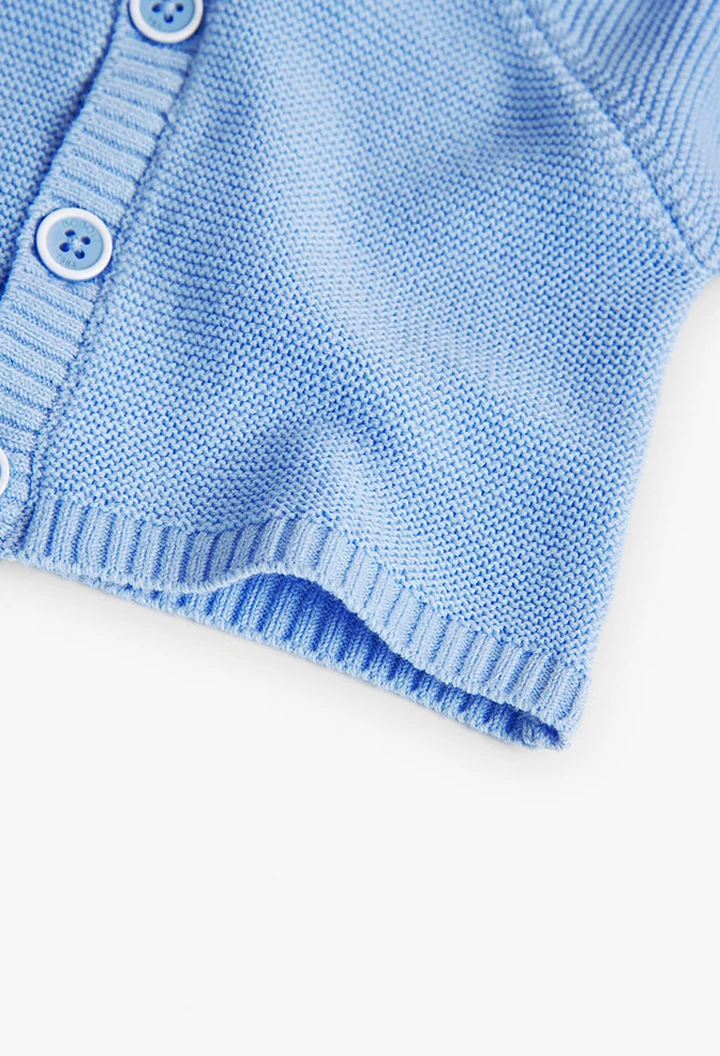 Veste tricotée pour bébé en bleu