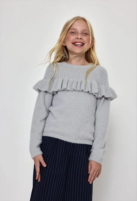 Jersey niña beige con volantes