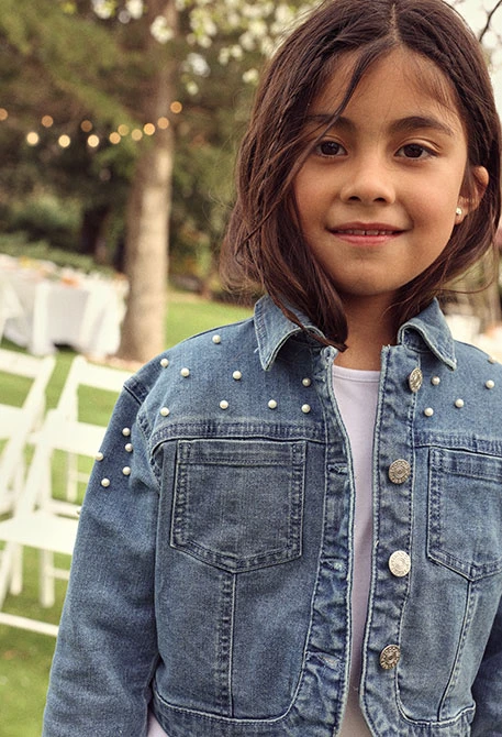 Giacca di jeans per bambina colore denim chiaro con fiocchetti
