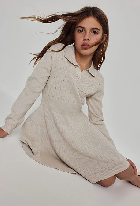 Cream knit dress with golden details
