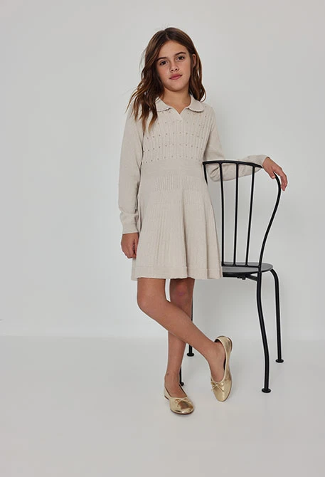 Cream knit dress with golden details