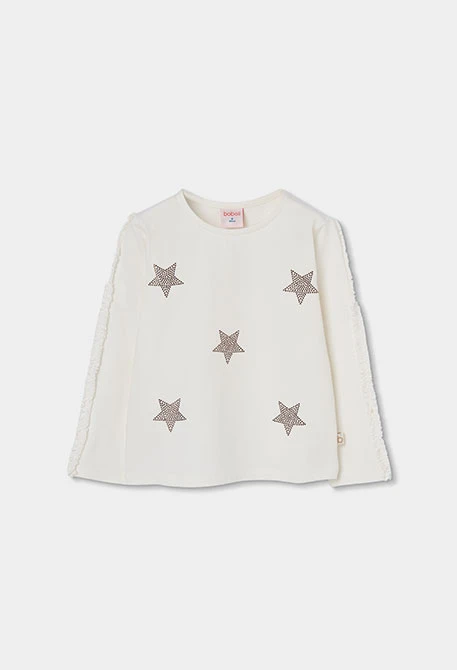 Maglietta in maglia da bambina bianca con stelle