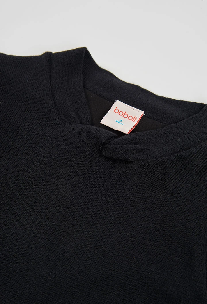 Vestit combinat negre amb faldilla plisada daurada
