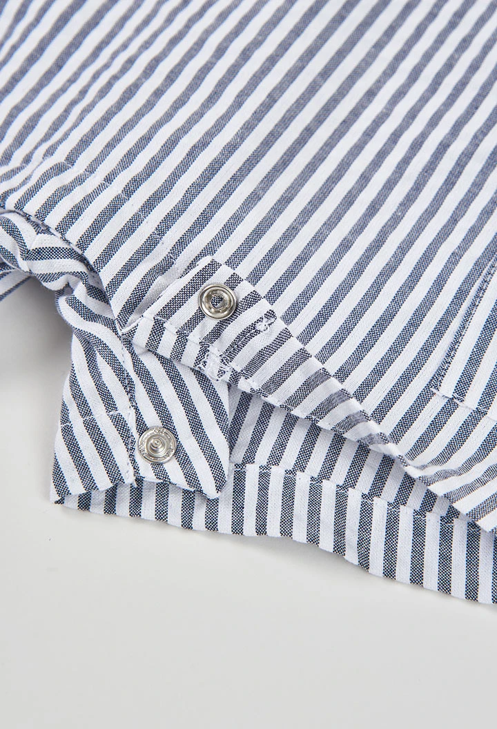 Conjunto polo y peto bebé algodón blanco azul