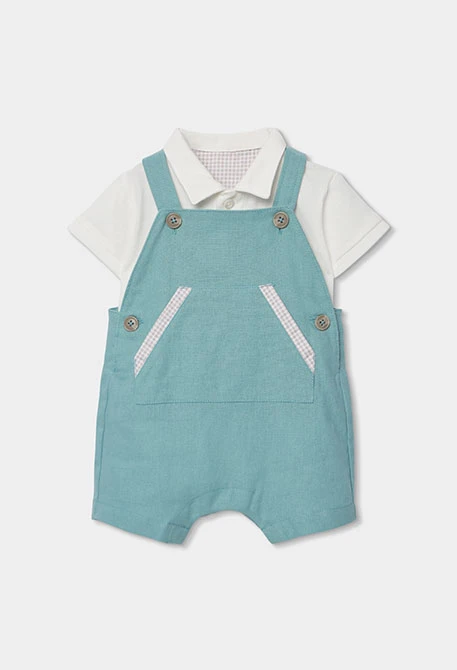 Baby outfit with polo shirt and green dungarees