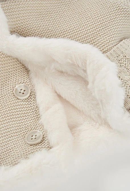 Reversible hooded baby knit jacket in beige