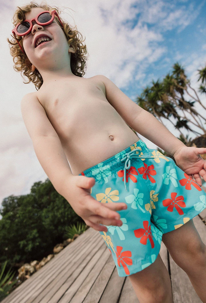 Maillot de bain en maille pour bébé garçon de couleur bleue avec imprimé