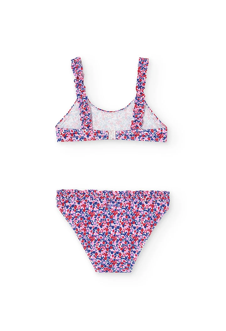 Polyamide bikini for girls with a floral print in red and blue.
