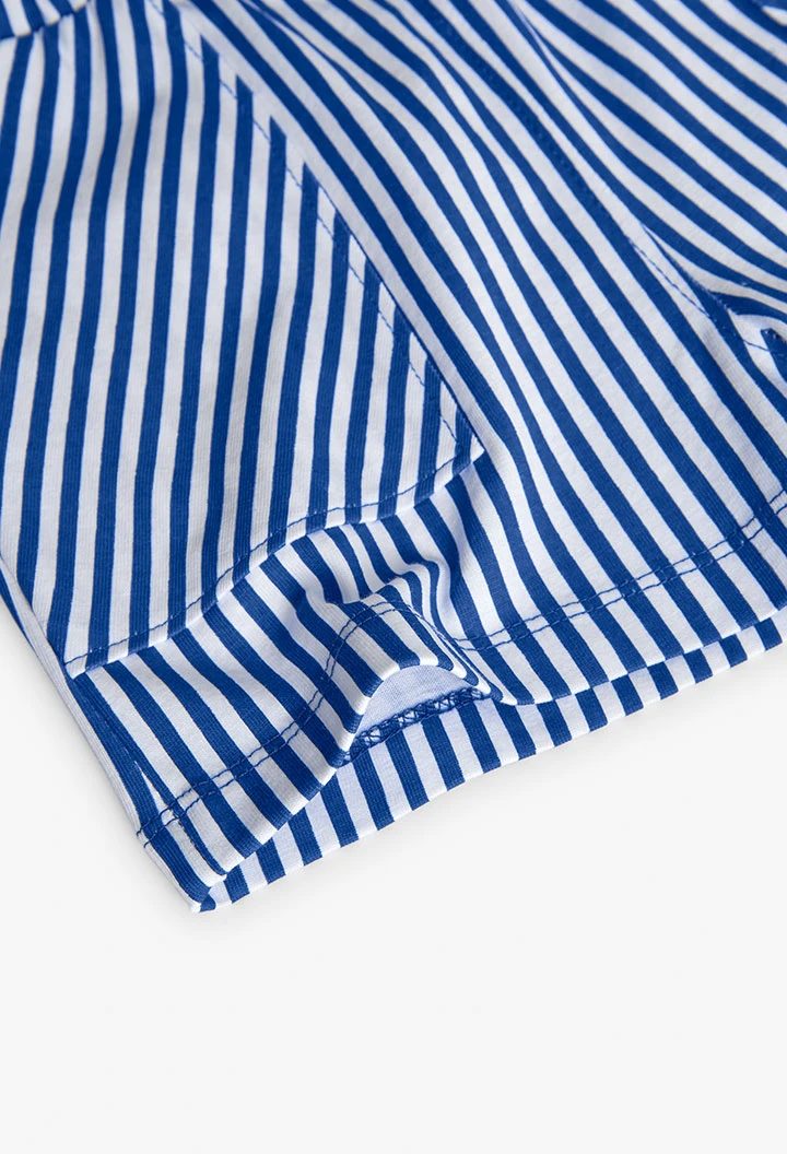 Short en maille pour fille avec imprimé à rayures bleu et blanc.
