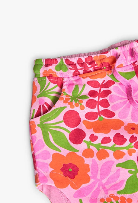 Shorts en maille pour fille avec imprimé en rose et vert.