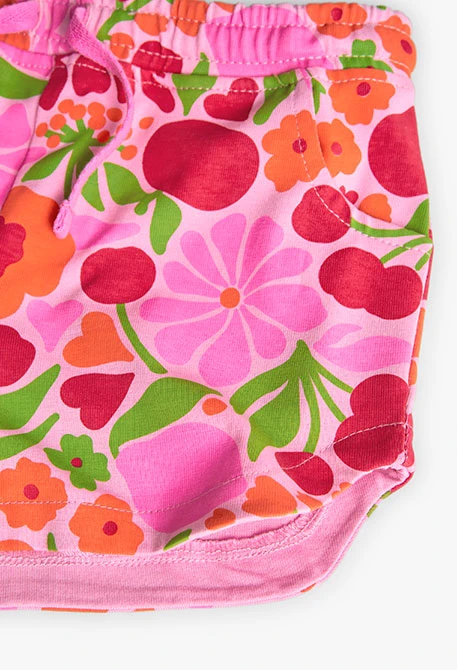 Shorts en maille pour fille avec imprimé en rose et vert.