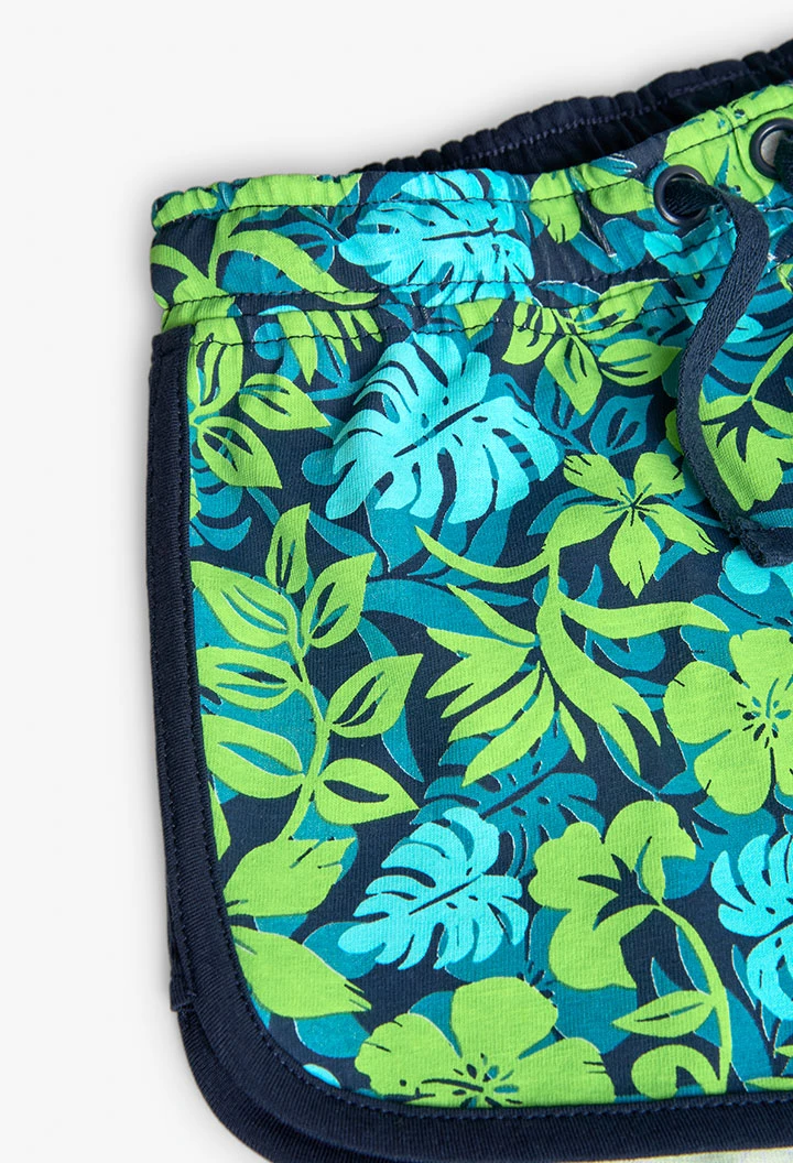 Short en maille pour fille avec un imprimé vert et bleu.