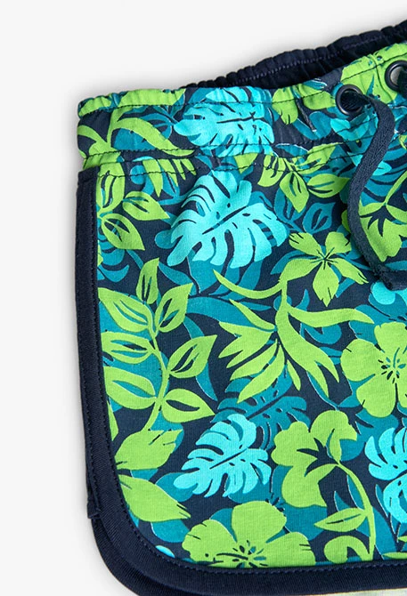 Short en maille pour fille avec un imprimé vert et bleu.