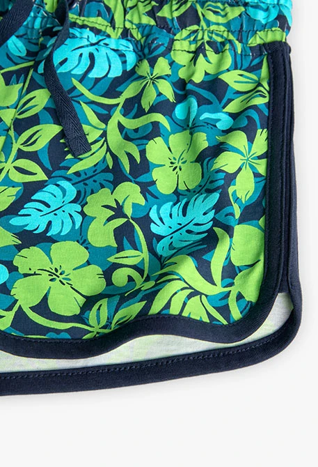 Short en maille pour fille avec un imprimé vert et bleu.