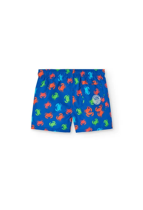 Boys\' swim trunks made from recycled fabric in blue with a crab print