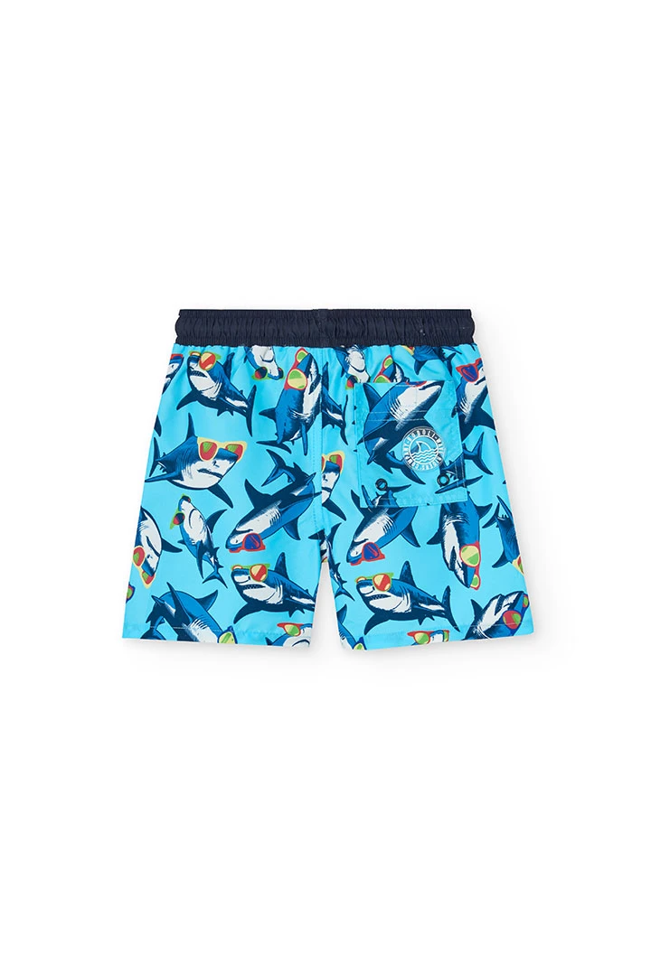 Maillot de bain en tissu recyclé pour garçon en bleu marine avec motif de requins.