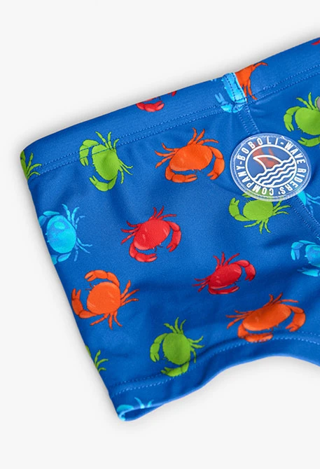 Fato de banho de poliamida para criança em azul com design de caranguejos