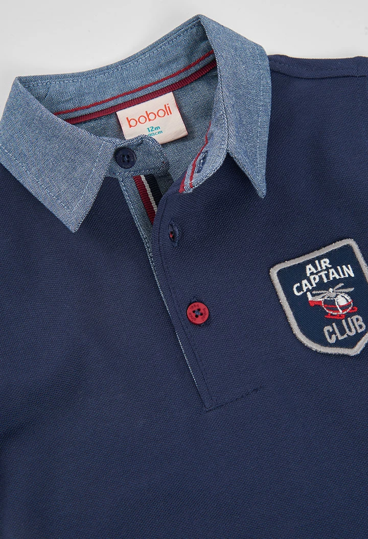 Polo garçon bleu marine avec écusson Air Captain Club
