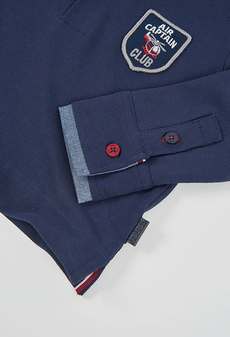 Polo garçon bleu marine avec écusson Air Captain Club
