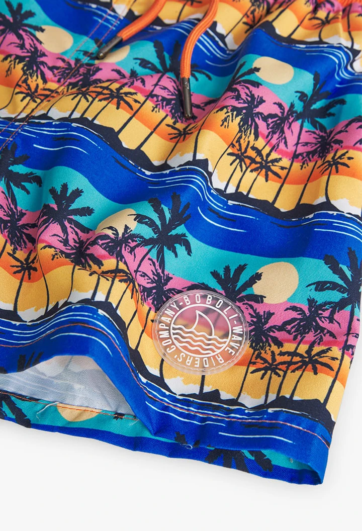Maillot de bain garçon avec imprimé palmier en couleur orange