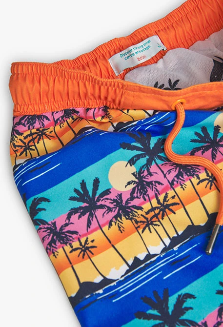 Boy's swimsuit with orange palm tree print