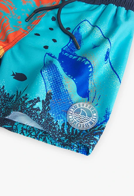 Boy's swimsuit in blue and with a print