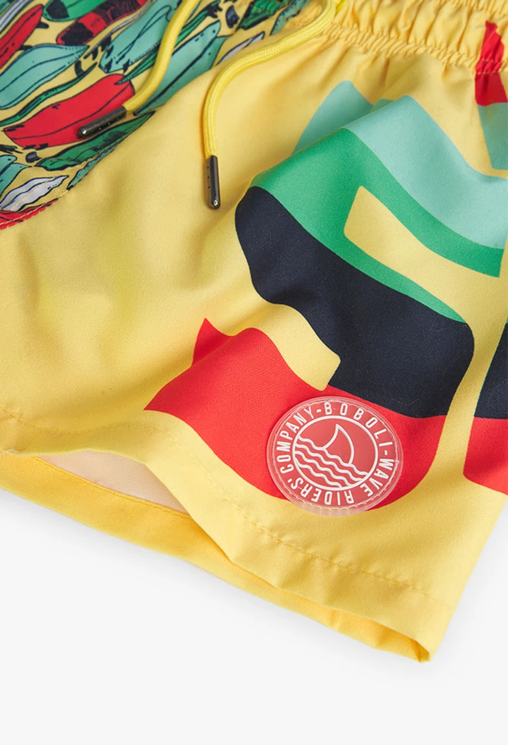 Bañador de niño estampado y de color amarillo