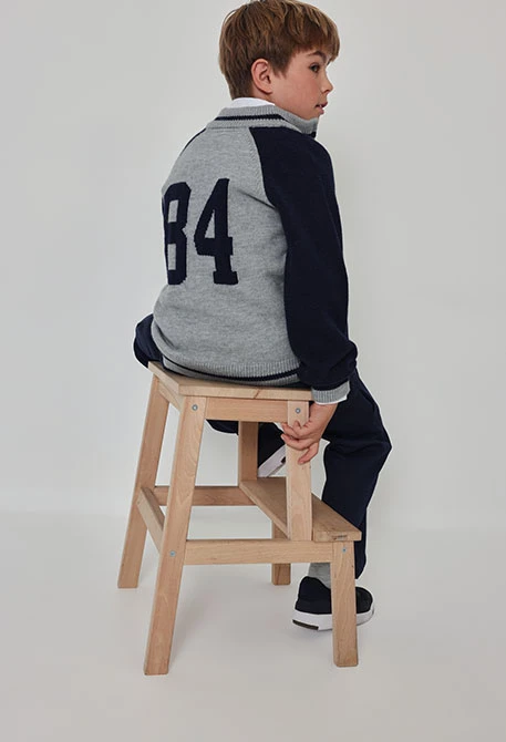 Giacca in maglia bambino blu navy abbinata grigio