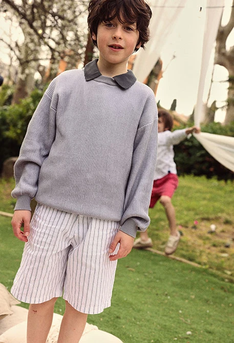 Striped white and black linen Bermuda shorts