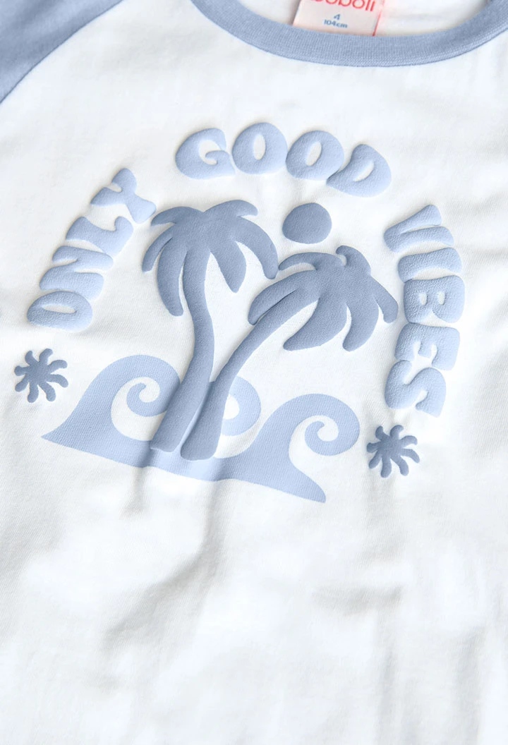 Pigiama corto in maglia per bambino con stampa in colore blu.